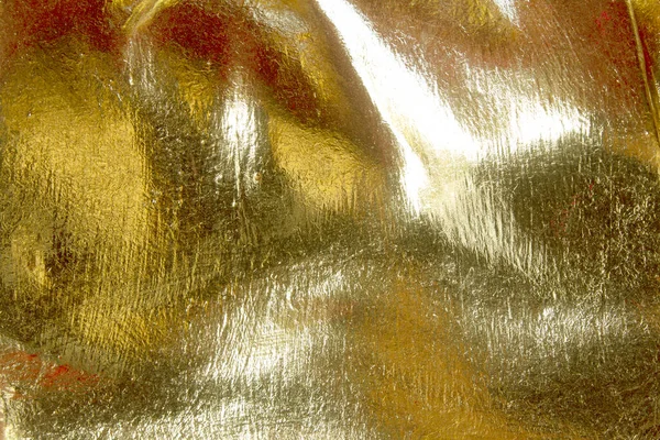 Parlak sarı yaprak altın folyo dokusu arka plan