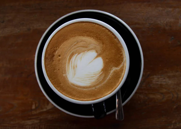 Black Cup Cappuccino Coffee Wooden Table — Fotografia de Stock