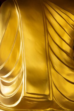 Gold Buddha statue back texture background