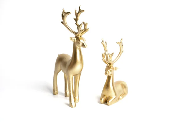 白地に金のセラミック製の鹿が2頭 ストック画像
