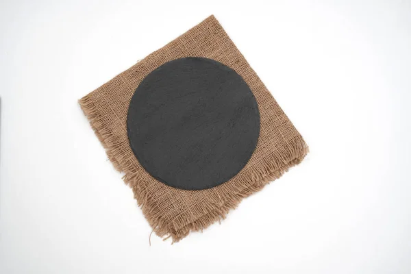 Empty Black Stone Plate Sack White Background — Zdjęcie stockowe