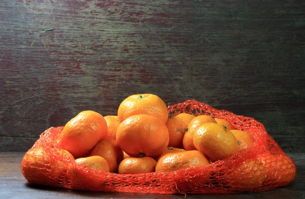 Oranžová na dřevo — Stock fotografie