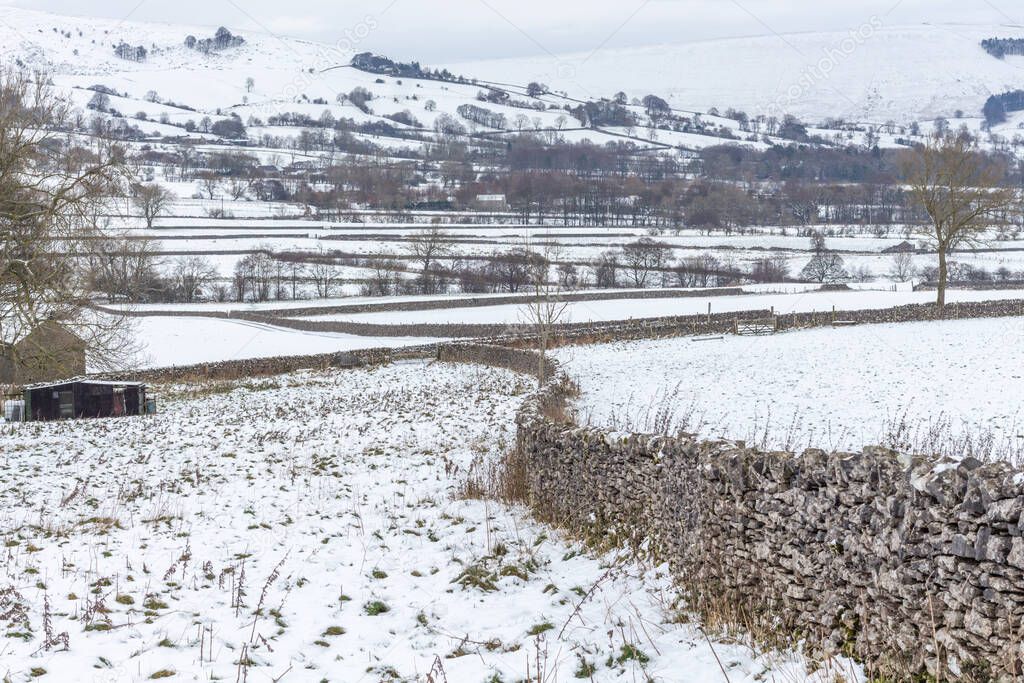 Winter view of snow covered countryside, Peak District, Derbyshire, UK.