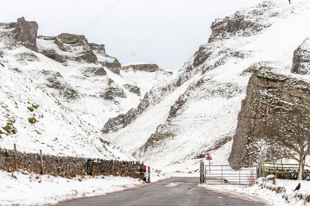Winter view of snow covered Winnats Pass. Peak District, Derbyshire, UK.