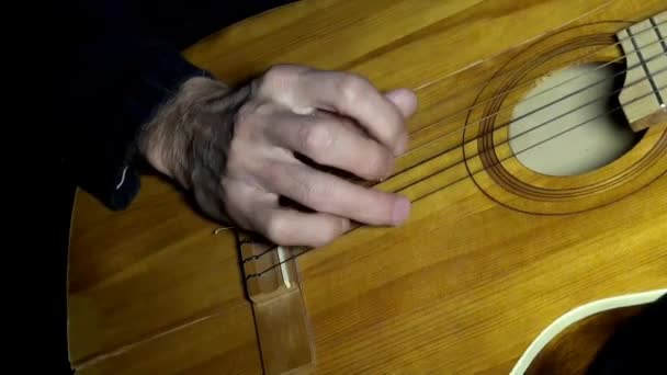 Playing guitar chords hand string — Stock Video