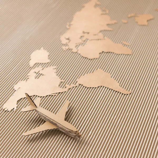 Cardboard map and airplane — Zdjęcie stockowe
