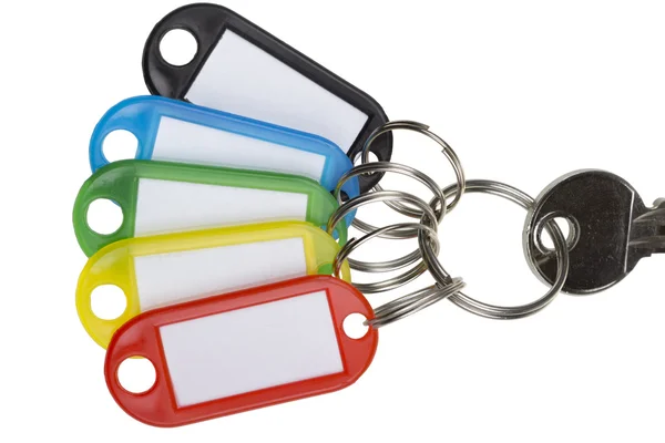 Uma chave com cinco tags — Fotografia de Stock
