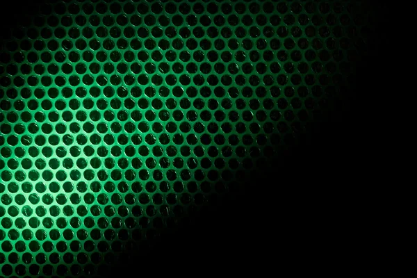 Luftpolsterfolie beleuchtet von grünem Licht. — Stockfoto