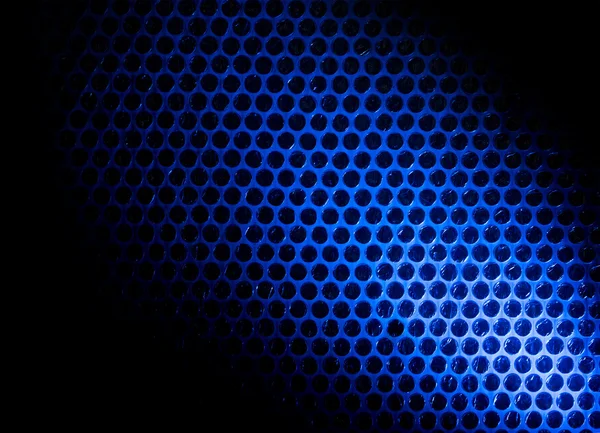 Luftpolsterfolie beleuchtet durch blaues Licht — Stockfoto