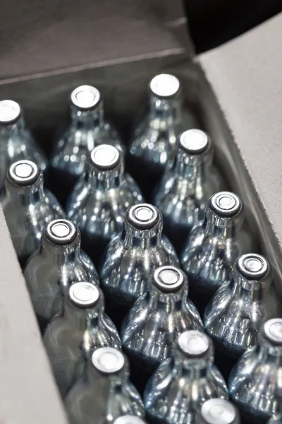 Soda chargers in carton box. — Stock Photo, Image