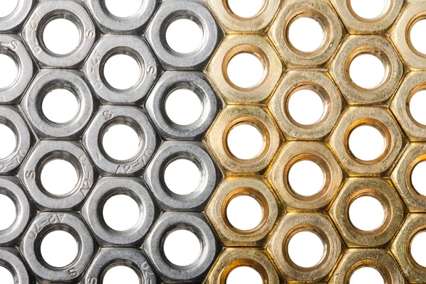 Golden and silver screw nuts — Stock Photo, Image