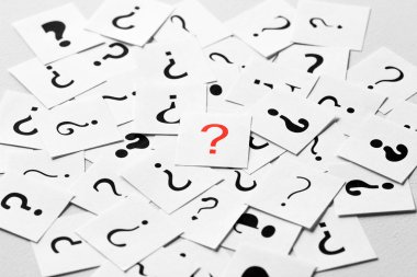 Red question mark with black questions