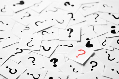 Red question mark with black questions