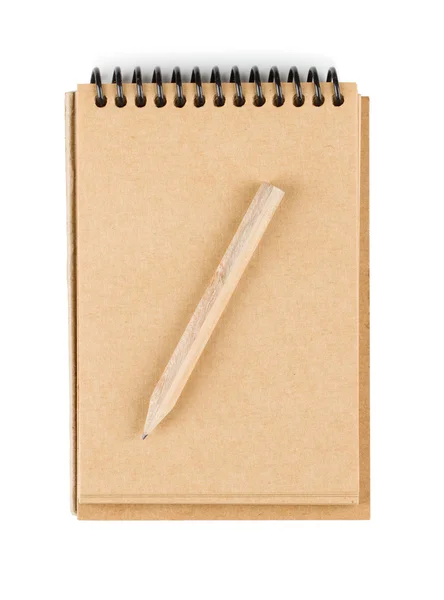 Paper notepad with small pencil Royalty Free Stock Images