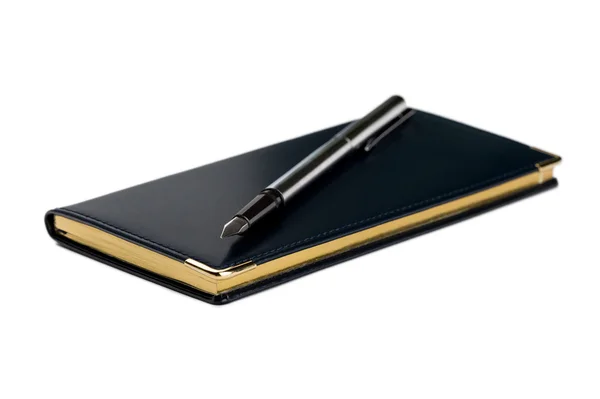 Black notebook and pen — Stock Photo, Image