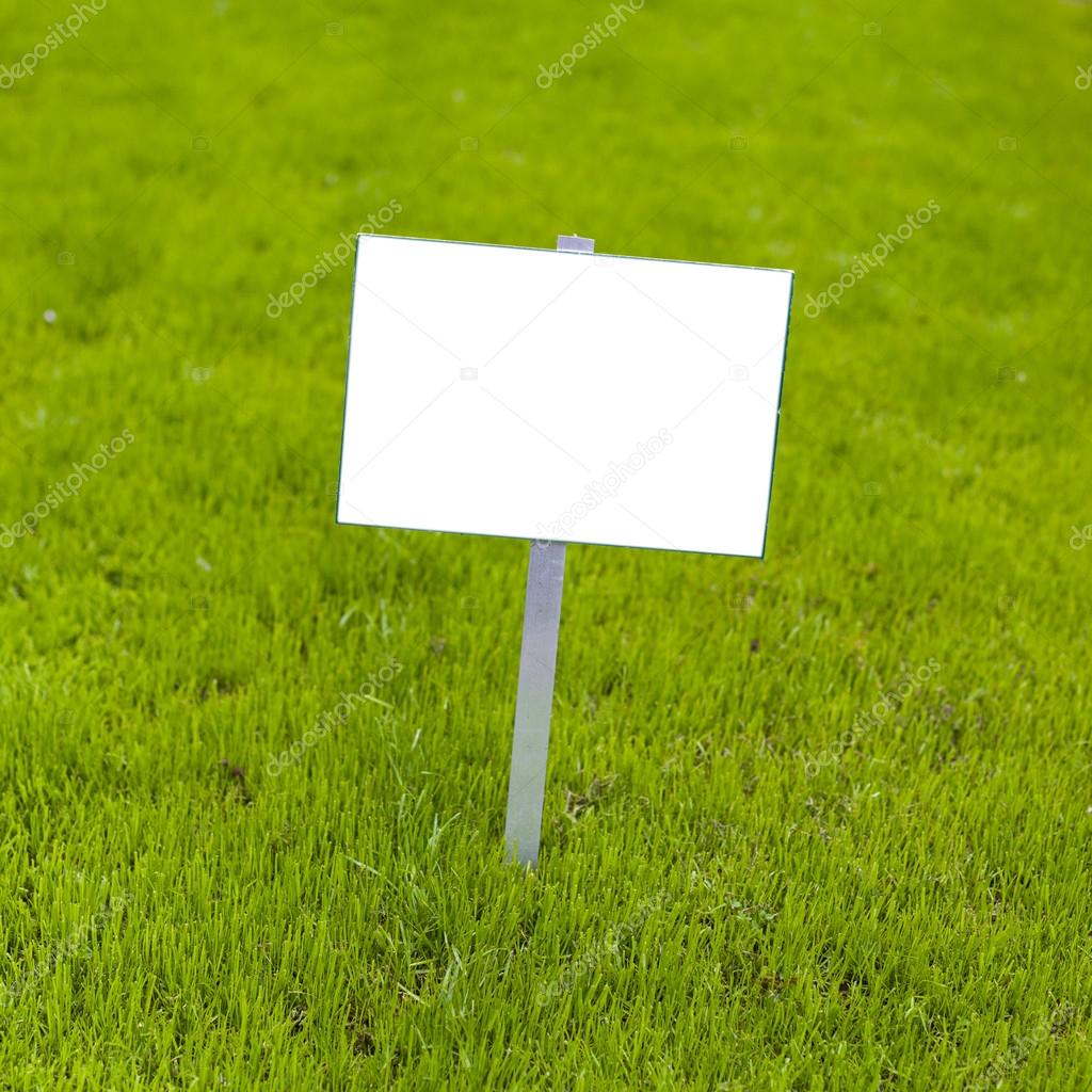 Sign on grass