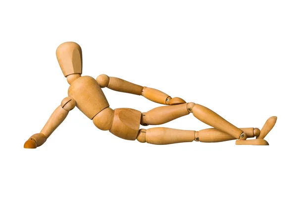 Wooden mannequin lying down — Stock Photo, Image