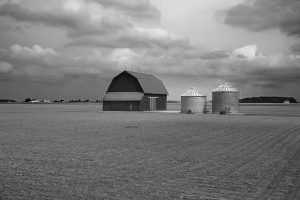 Agricultural Scene Black White Barn Two Silos Surrounded Freshly Plowed — Fotografia de Stock