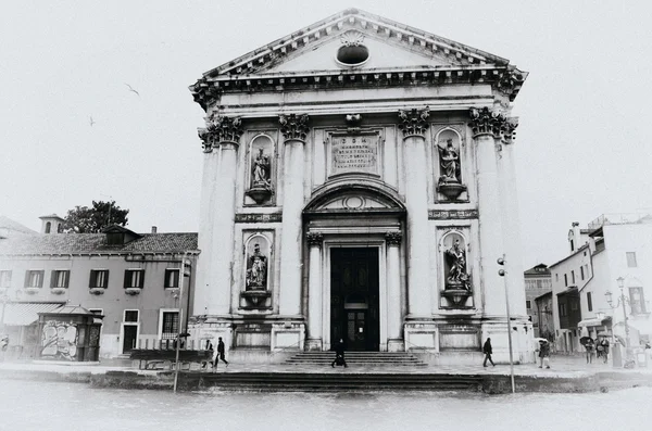 Church by the grand channel in Venice, Italy — стоковое фото