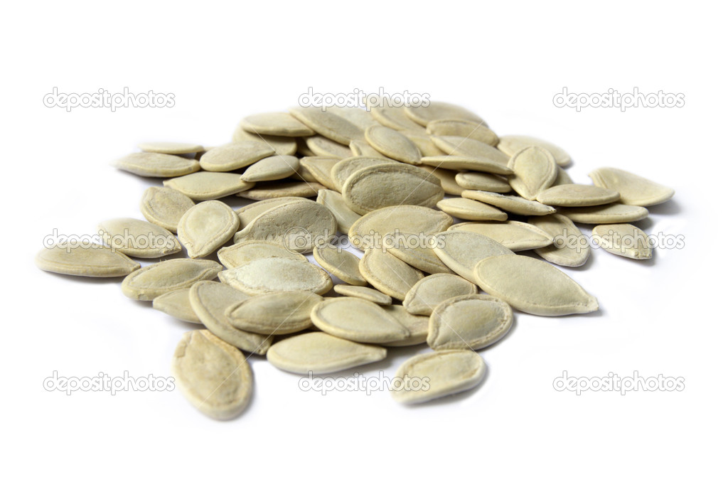 Pumpkin Seeds Isolated On The White Background