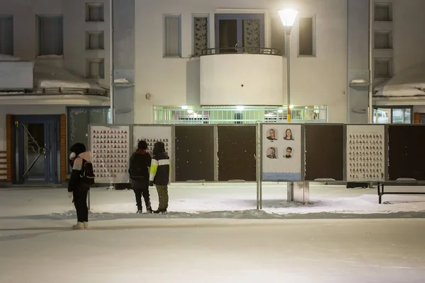 Group Young Boys Looking Closely Election Candidates Posters Winter Night — Stock Photo, Image