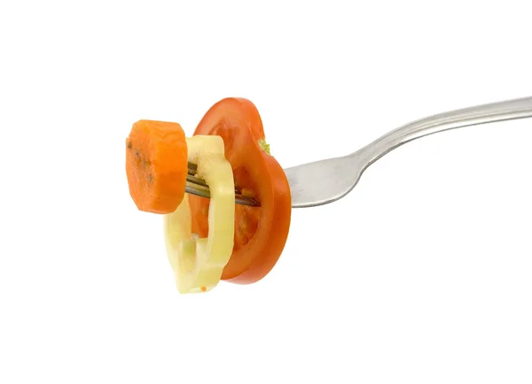 Vegetable slices on fork — Stock Photo, Image
