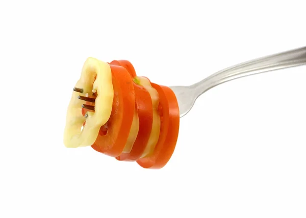 Pepper and tomato on fork — Stock Photo, Image