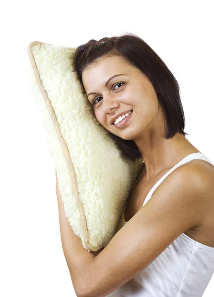 Молодая красивая женщина с подушкой — стоковое фото