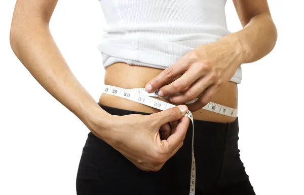 Woman measuring the hips — Stock Photo, Image