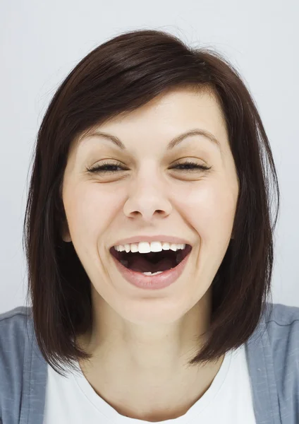 Young girl laughing sincerely — Stock Photo, Image