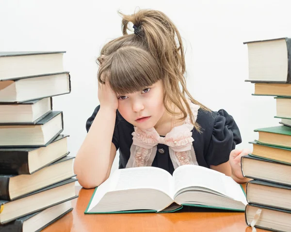 Little tired girl with books — Stock Photo, Image