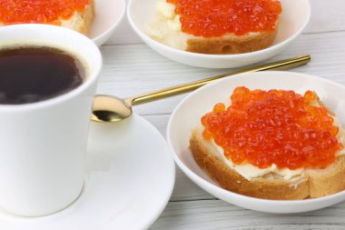 deluxe breakfast coffee and canapes with red caviar