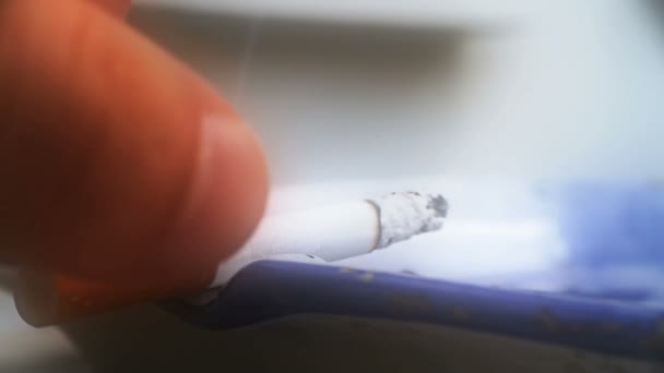 Cigarette burns on ashtray — Stock Video
