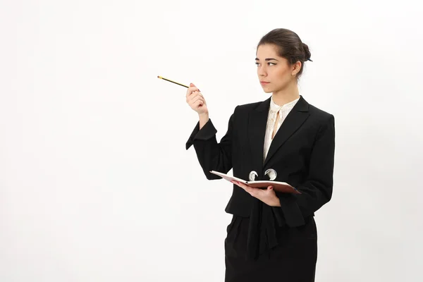 Attractive businesswoman with a pencil — Stock Photo, Image