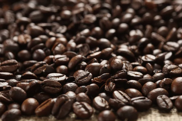 Coffee beans on cloth sack — Stock Photo, Image