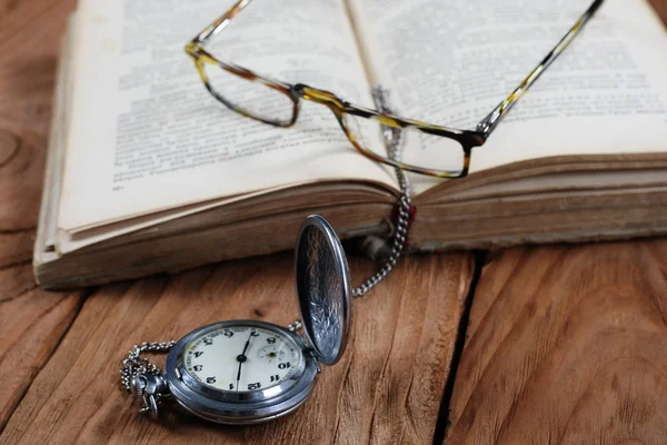 Old book vintage watches glasses — Stock Photo, Image