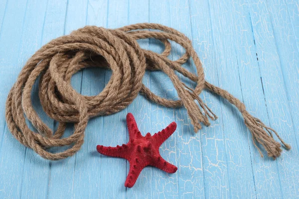 Rope  starfish on blue  background — Stock Photo, Image