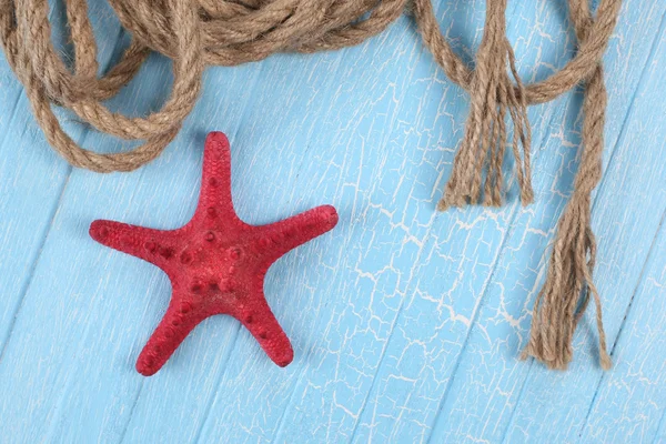 Rope  starfish on blue  background — Stock Photo, Image