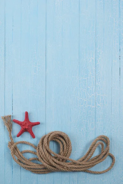 Rope  starfish on blue  background — Stock Photo, Image