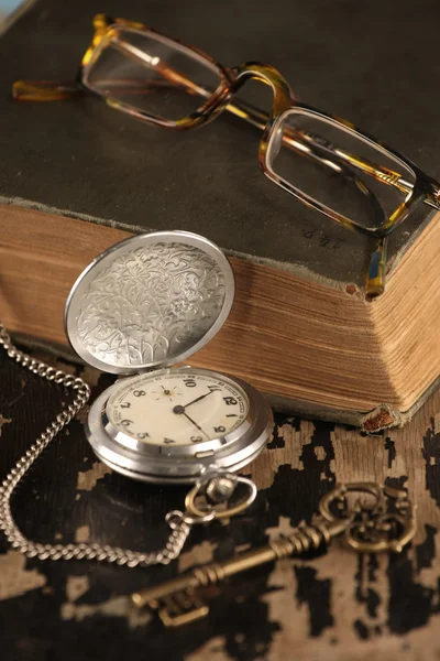 Vintage pocket watch old book brass key — Stock Photo, Image