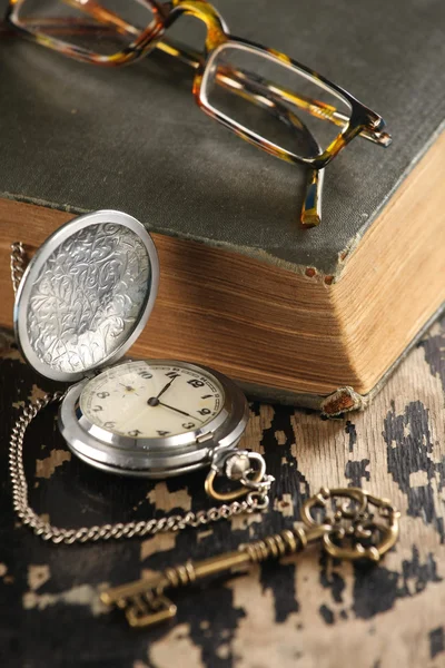 Vintage pocket watch old book and Brass Key — Stock Photo, Image