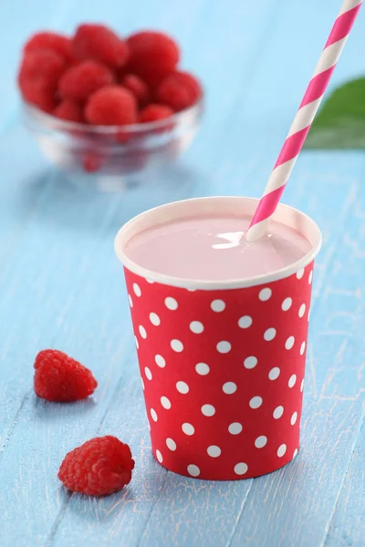 Raspberry yogurt cup with a straw — Stock Photo, Image