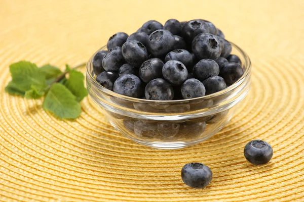 Fresh berries in a glass bowl — Stock Photo, Image