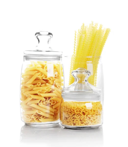 Macaroni in glass container — Stock Photo, Image