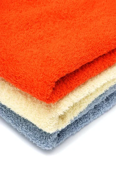 Haufen farbiger Handtücher — Stockfoto