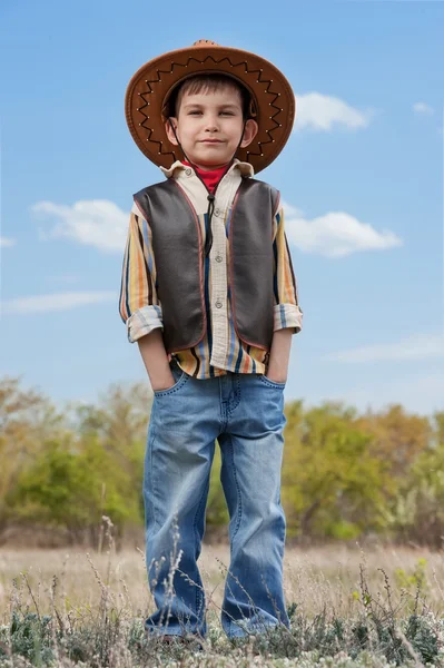 Boy v kovbojský oblek — Stock fotografie