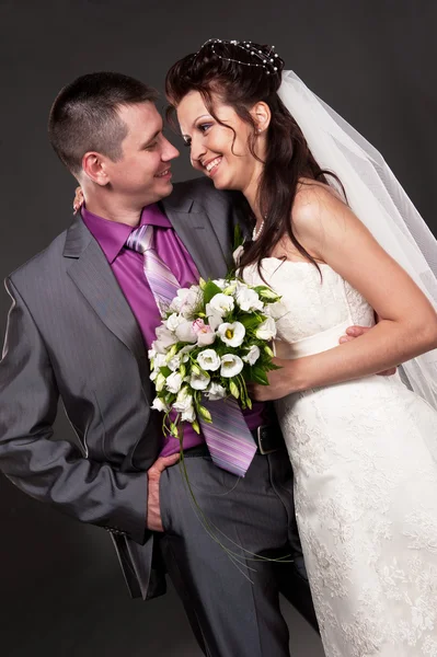 Bride and the groom in studio — Stock Photo, Image