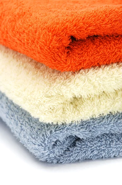 Haufen farbiger Handtücher — Stockfoto