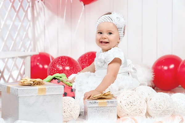 Young girl with a gift on his birthday — Stock Photo, Image