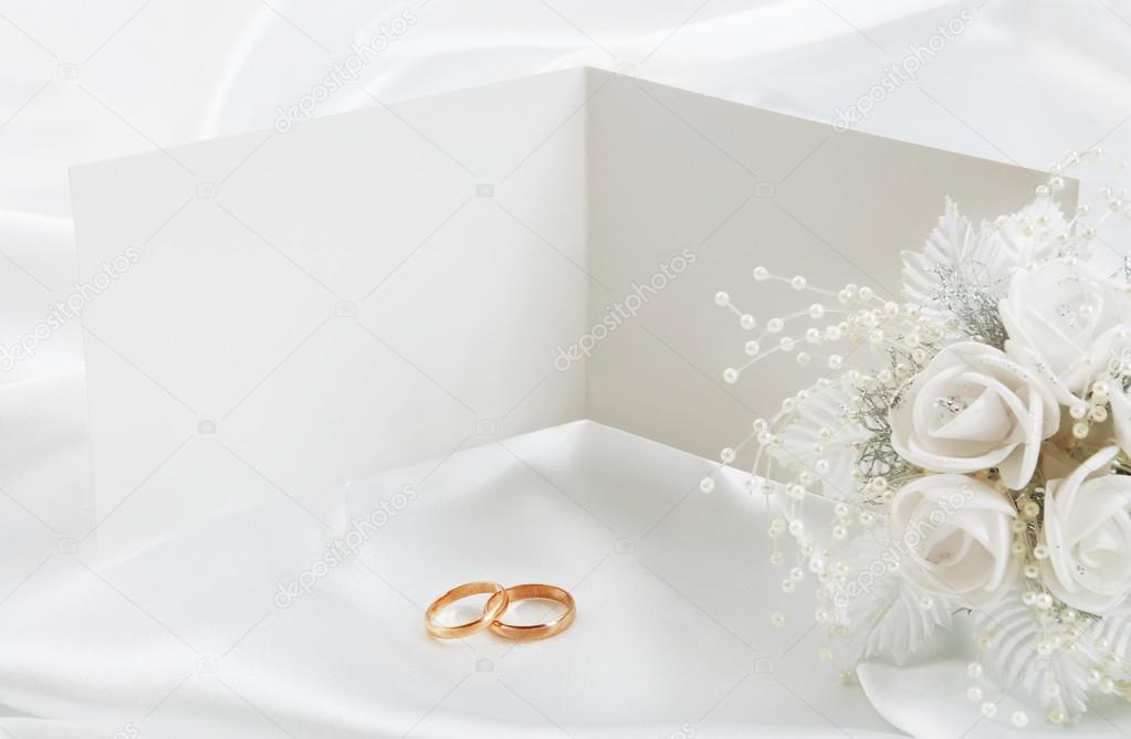 Wedding invitation with rings and a bouquet